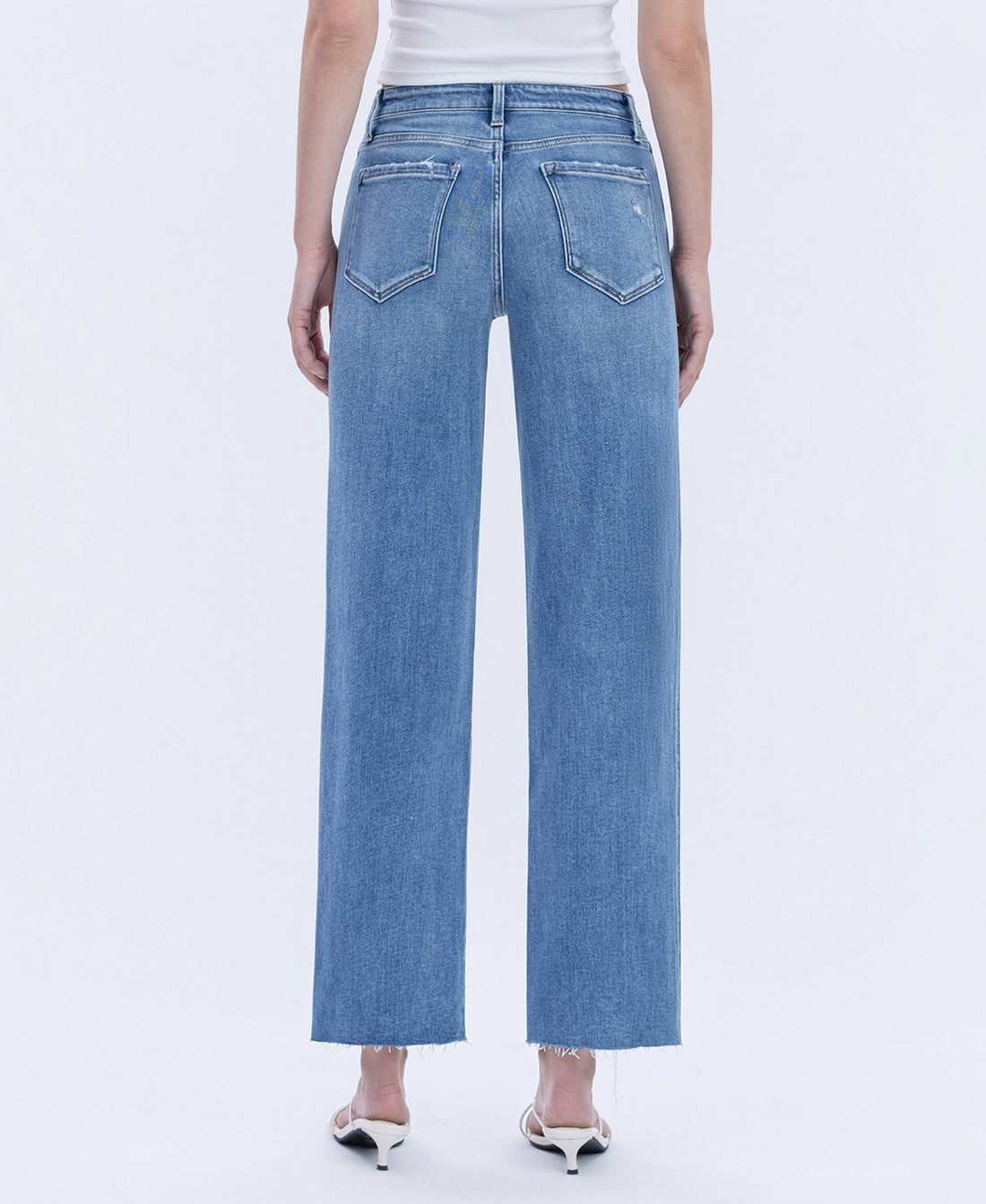 High Rise Raw Hem Slim Jeans