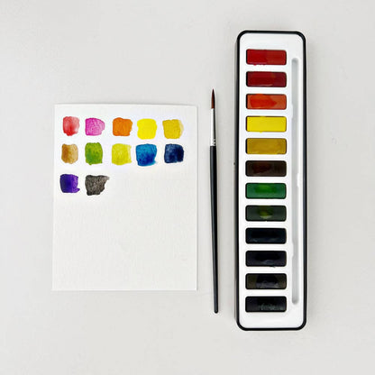 Watercolor paint set with brush